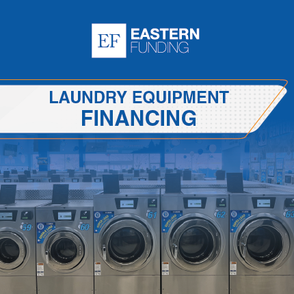 Row of commercial washing machines in laundromat
